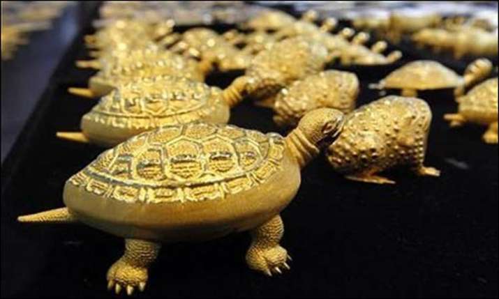 Gold rises by Rs 377 on robust demand Gold rises by Rs 377 on robust demand- India TV Paisa