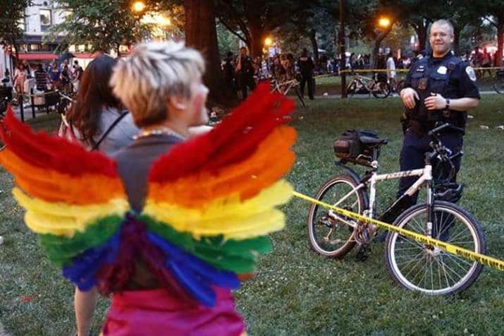 Indian American held for brandishing gun, setting off panic at gay pride parade in United States | A Indian American held for brandishing gun, setting off panic at gay pride parade in United States | A- India TV