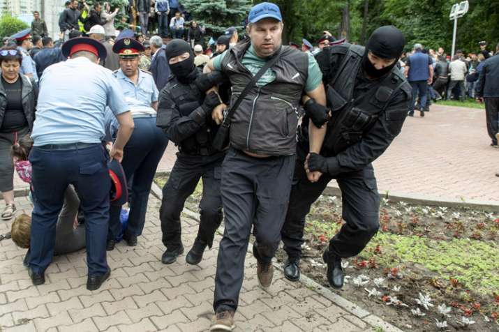 Kazakhstan police beat journalist amid post-vote unrest | AP Kazakhstan police beat journalist amid post-vote unrest | AP- India TV Hindi