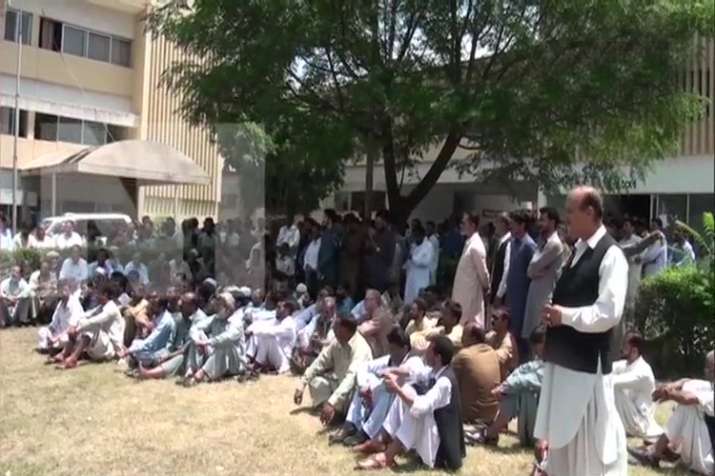 Government workers in PoK staged protest against the... Government workers in PoK staged protest against the...- India TV