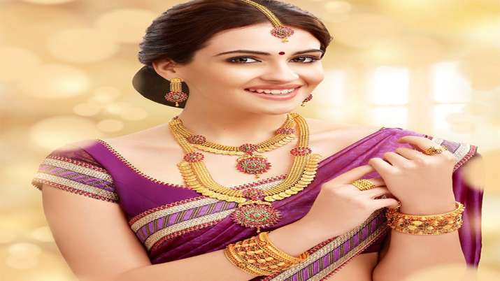 Gold slides Rs 70 on muted demand; silver jumps Rs 660 Gold slides Rs 70 on muted demand; silver jumps Rs 660- India TV Paisa