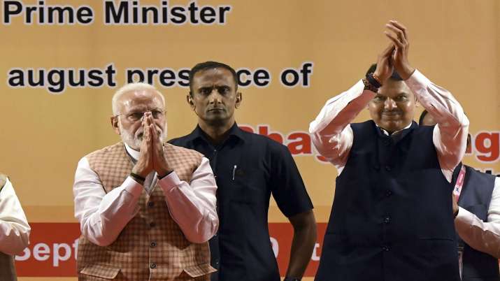 Prime Minister Narendra Modi with Maharashtra Chief Minister Devendra Fadnavis during the inaugurati Prime Minister Narendra Modi with Maharashtra Chief Minister Devendra Fadnavis during the inaugurati- India TV Paisa