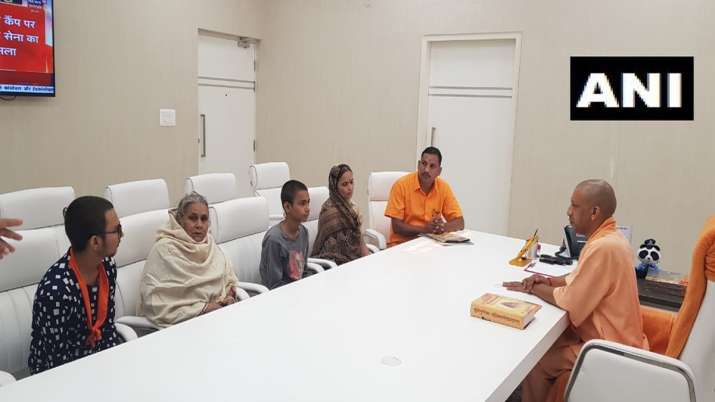 Family of Kamlesh Tiwari meets Chief Minister Yogi Adityanath at his residence | ANI Family of Kamlesh Tiwari meets Chief Minister Yogi Adityanath at his residence | ANI- India TV