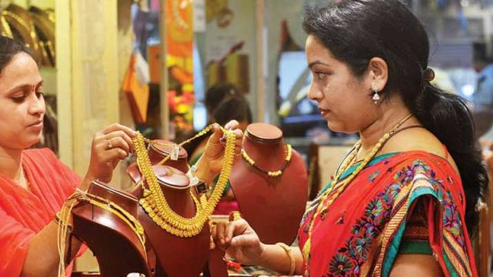 Gold rises Rs 296 on weaker rupee, rally in global prices Gold rises Rs 296 on weaker rupee, rally in global prices- India TV Paisa