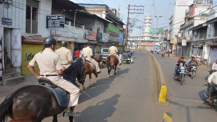 Mounted Police personnel patrol in a street as part of precautionary measures in view of Supreme Cou Mounted Police personnel patrol in a street as part of precautionary measures in view of Supreme Cou- India TV