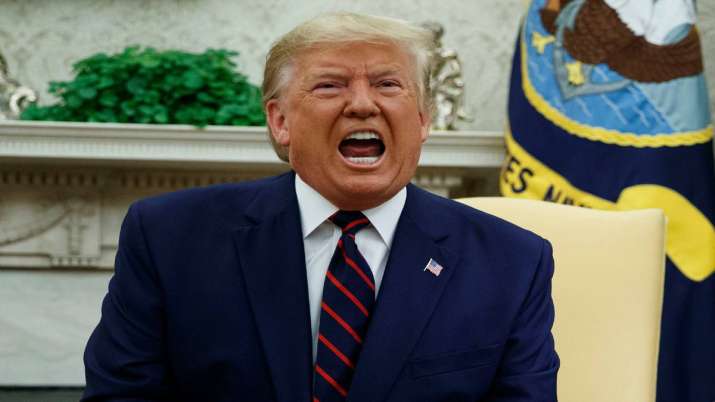 Trump angry with Apple for not unlocking phones for probe Trump angry with Apple for not unlocking phones for probe- India TV Paisa