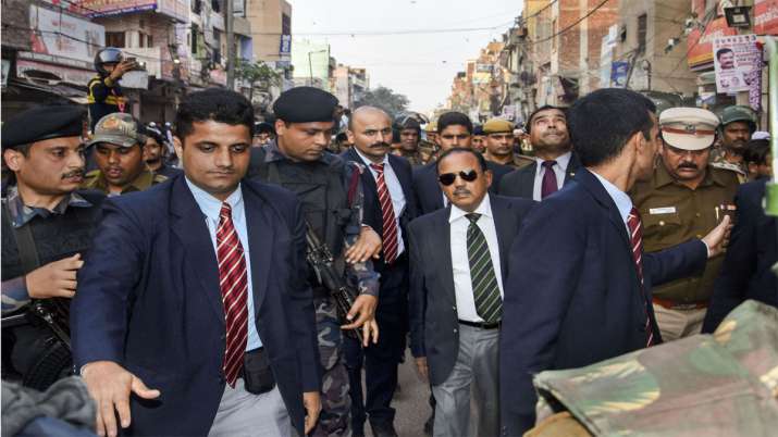 National Security Advisor (NSA) Ajit Doval during his visit to the riot affected areas to assess gro National Security Advisor (NSA) Ajit Doval during his visit to the riot affected areas to assess gro- India TV