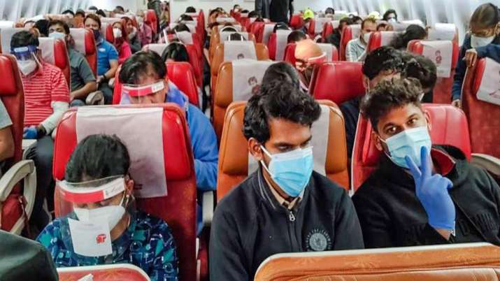 Infosys brings back over 200 employees, their families from US via chartered flight Infosys brings back over 200 employees, their families from US via chartered flight- India TV Paisa