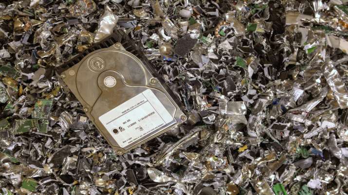 man throws hard drive with bitcoins value