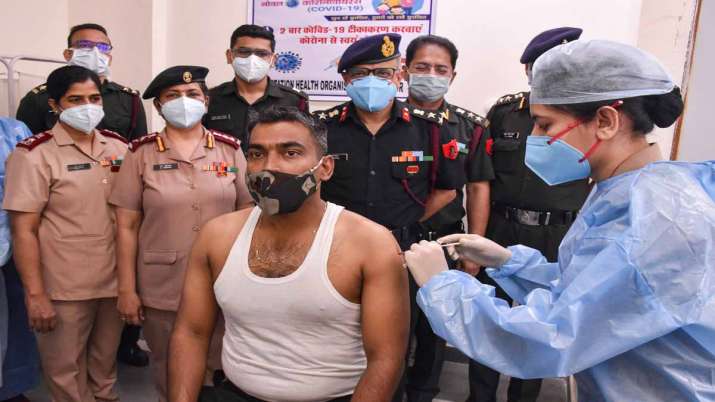 Indian Army personnel receives a dose of COVID-19 vaccine at a military hospital in Jabalpur Indian Army personnel receives a dose of COVID-19 vaccine at a military hospital in Jabalpur- India TV Paisa