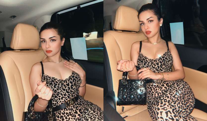 In these pictures, Avneet is wearing a stylish dress with animal print, whose neck is quite deep. Black belt is worn with the outfit. In these pictures, Avneet is wearing a stylish dress with animal print, whose neck is quite deep. Black belt is worn with the outfit.