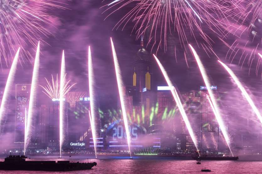 Fireworks are set off over Victoria Harbour to celebrate the start of 2025 in Tsim Sha Tsui, Hong Kong, on Wednesday, Jan. 1, 2025.