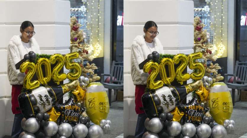 A woman is seen during the celebrations at Connaught Place in New Delhi