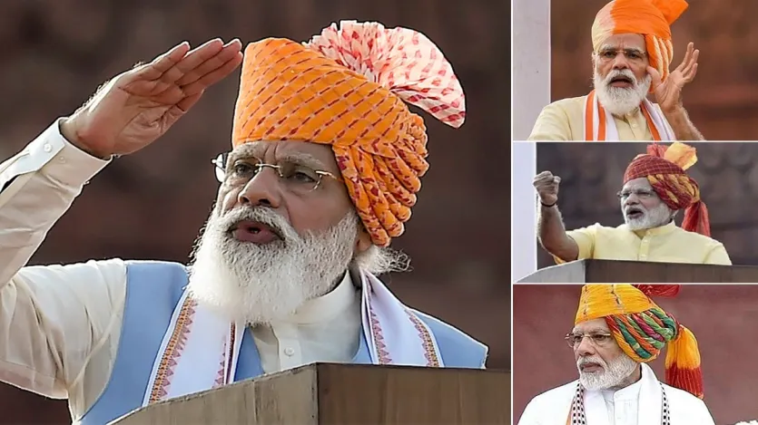 2021 में पीएम मोदी ने केसरी-लाल पैटर्न वाली पगड़ी पहनी थी और इसके साथ नीले रंग का जैकेट पहना था।