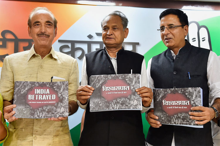 Ghulam Nabi Azad, Ashok Gehlot and Randeep Singh Surjewala | PTI Ghulam Nabi Azad, Ashok Gehlot and Randeep Singh Surjewala | PTI- India TV Hindi