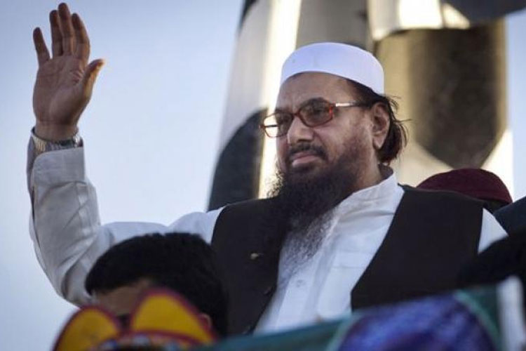 Pakistan SC allows Hafiz Saeed Jamaat-ud-Dawaa to run charity work | AP File Pakistan SC allows Hafiz Saeed Jamaat-ud-Dawaa to run charity work | AP File- India TV Hindi