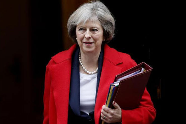 Theresa May survives confidence vote, says MPs must 'work together' to deliver Brexit | AP File Theresa May survives confidence vote, says MPs must 'work together' to deliver Brexit | AP File- India TV Hindi