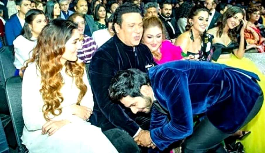 Varun Dhawan touches Govinda feet Varun Dhawan touches Govinda feet- India TV Hindi