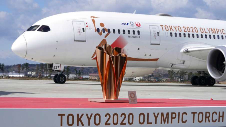 Olympic flame reaches Japan amid Corona outbreak, will it be held on schedule? Olympic flame reaches Japan amid Corona outbreak, will it be held on schedule?- India TV Hindi