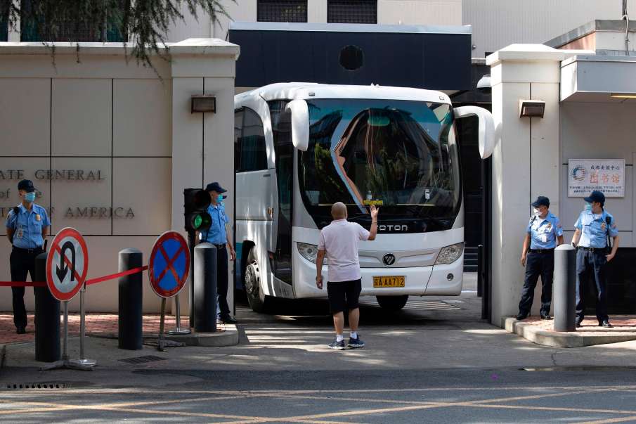 US Diplomats start leaving Chengdu Consulate, American flag lowered US Diplomats start leaving Chengdu Consulate, American flag lowered- India TV Hindi