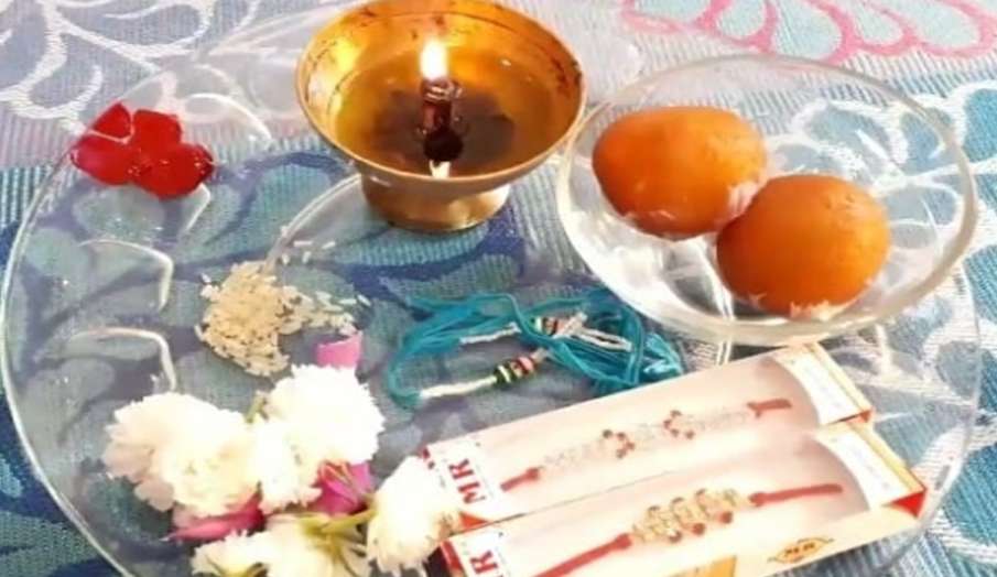 राखी की थाली में जचरूर रखें ये चीजें राखी की थाली में जचरूर रखें ये चीजें- India TV Hindi