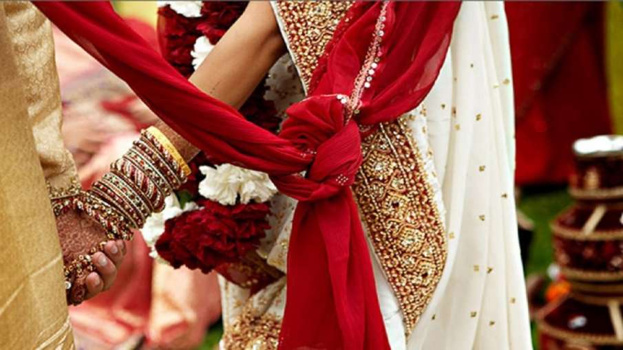 UP yogi govt marriage coronavirus covid 19 guidelines. Only 100 people are allowed in UP weddings UP yogi govt marriage coronavirus covid 19 guidelines. Only 100 people get married in UP weddings- India TV Hindi