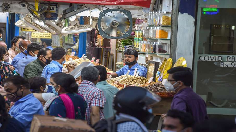 New Delhi: People buy dry fruits from a shop at Chandni... New Delhi: People buy dry fruits from a shop at Chandni...- India TV Hindi