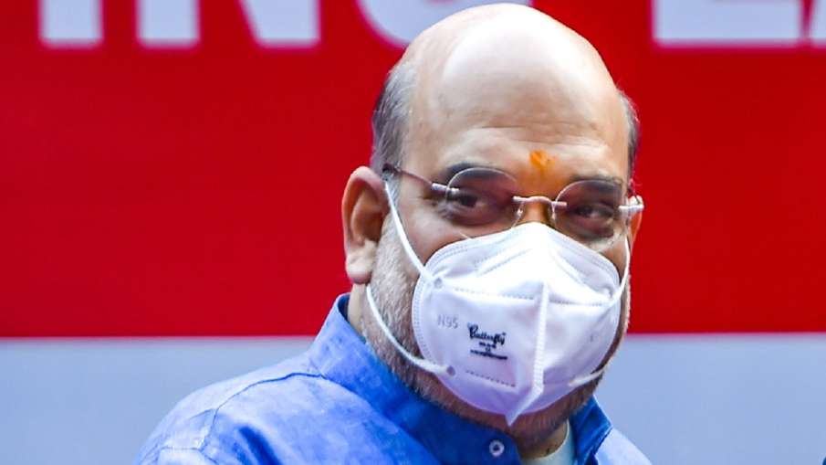 मास्क पहनना करना होगा अनिवार्य, पीएम मोदी के साथ बैठक में अमित शाह का बयान मास्क पहनना करना होगा अनिवार्य, पीएम मोदी के साथ बैठक में अमित शाह का बयान- India TV Hindi