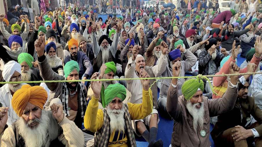 Farmers stage a protest against Centre's farm reform laws at Tikri border, in New Delhi on Thursday. Farmers stage a protest against Centre's farm reform laws at Tikri border, in New Delhi on Thursday.- India TV Hindi