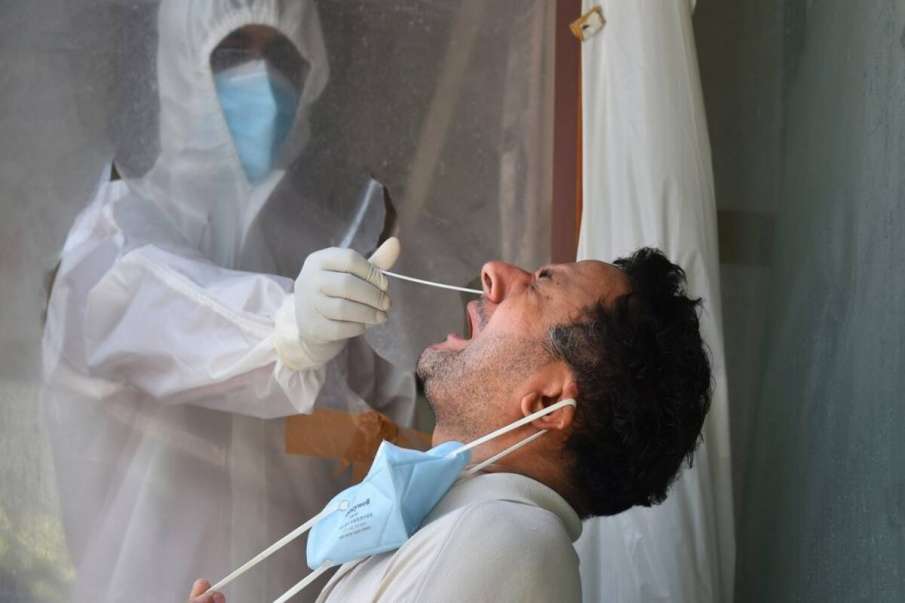 MP's COVID-19 count grows by 12,384, death toll by 75 MP's COVID-19 count grows by 12,384, death toll by 75- India TV Hindi