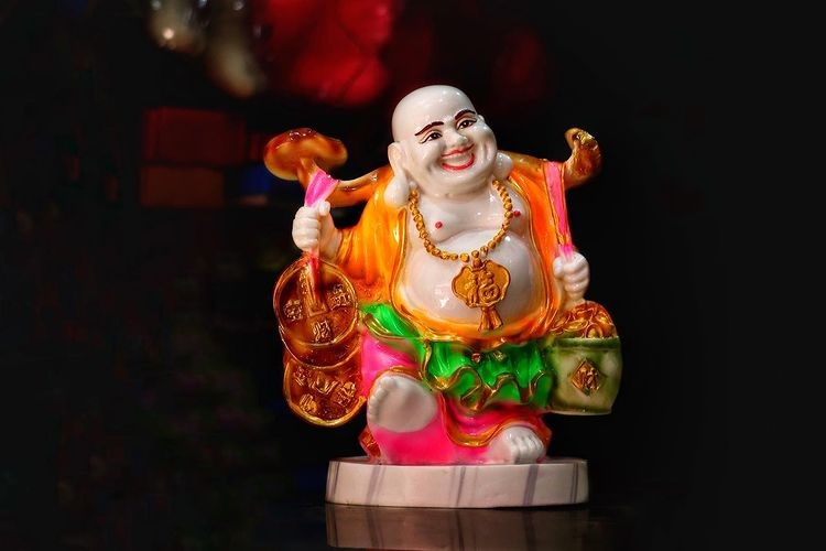 vastu tips today laughing buddha statue for home in hindi vastu tips today laughing buddha statue for home in hindi- India TV Hindi