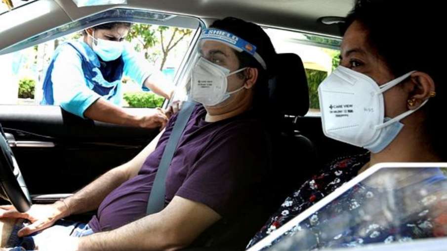 COVID-19: Noida starts UPs first drive-through vaccination for 45+ COVID-19: Noida starts UPs first drive-through vaccination for 45+- India TV Hindi