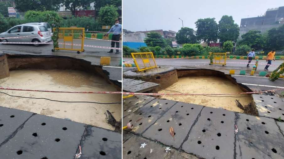 गाज़ियाबाद: लगातार हो रही बारिश से इंदिरापुरम में सड़क धंसी, गहरे गड्ढे में भरा पानी, बड़ा हादसा टला गाज़ियाबाद: लगातार हो रही बारिश से इंदिरापुरम में सड़क धंसी, गहरे गड्ढे में भरा पानी, बड़ा हादसा टला- India TV Hindi