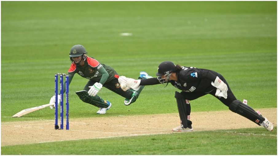 Jahanara Alam of Bangladesh dives to the crease as Katey Martin of New Zealand attempts to run out - India TV